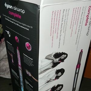 Dyson Airwrap like new  has all attachments, manual, registration, and warranty